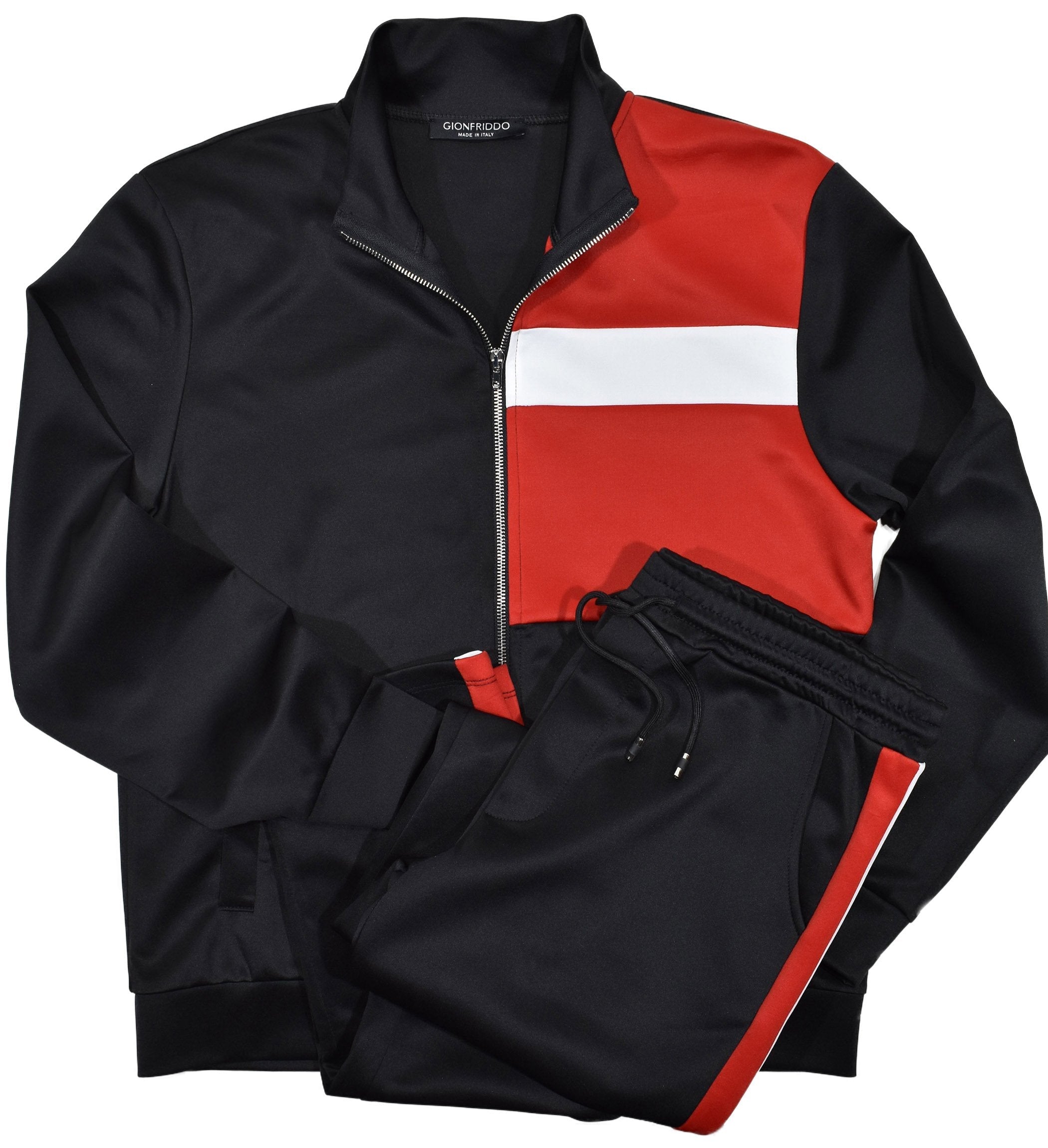 Invigorate your lifestyle with the Gionfriddo soft sateen leisure set. The coat features an inset color block with classic ribbed cuffs and waist band as well as side pockets. The draw string pant has open bottoms and side pockets. Medium weight, soft material with a slight sheen for a fashion look and feel. Classic fit. Italian Sport Leisure Set Side slash pockets. Open cuff and bottom. Medium weight fabric. Classic Fit.